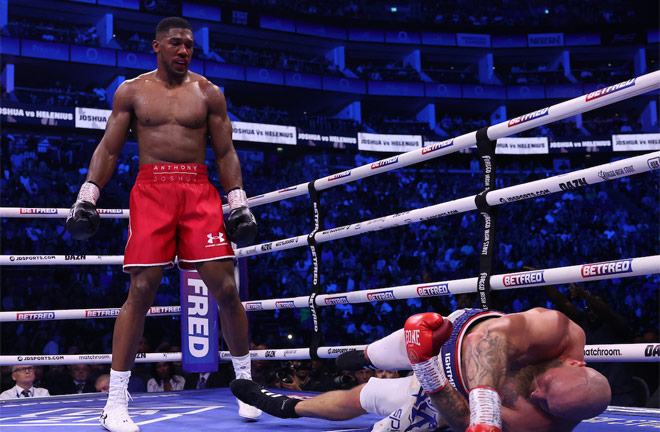 Referee Victor Loughlin waved off the fight immediately after Joshua landed a devastating right hand on Helenius Photo Credit: Mark Robinson/Matchroom Boxing