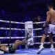 Gill celebrates beating Conlan as referee Howard Foster calls a halt to the contest Photo Credit: Mark Robinson/Matchroom Boxing