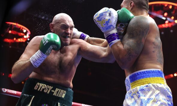 Image: Usyk's Coach Disputes Referee's Standing Eight Count for Fury