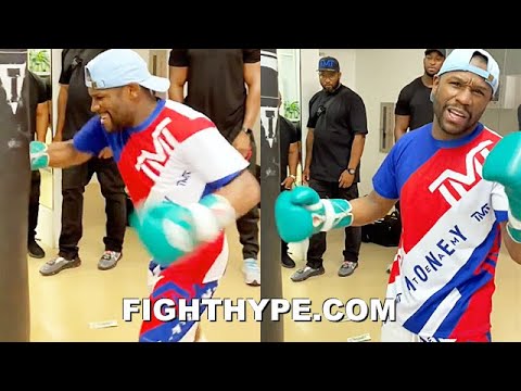 FLOYD MAYWEATHER KO MONEY SHOTS LIGHT UP HEAVY BAG; SENDS "LIGHT WORK" WARNING TO LOGAN PAUL