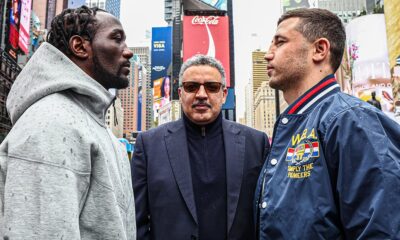 Crawford (L), Madrimov (R) pose in Times Square, New York. Mandatory Credit: Ed Mulholland/Matchroom.