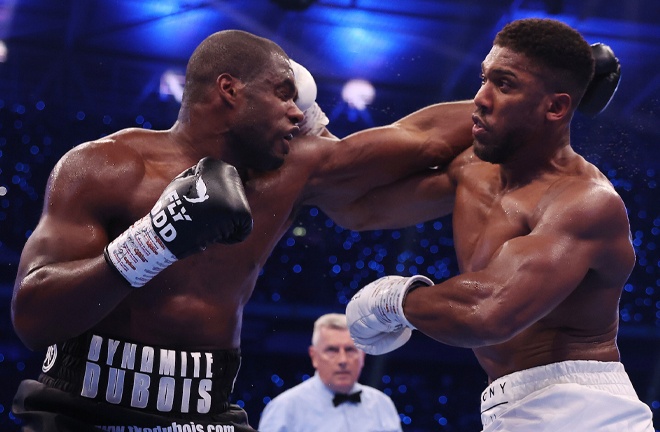 Dubois set about Joshua from the off (Photo Credit: Mark Robinson Matchroom Boxing)