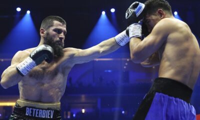 Beterbiev celebrates after beating Bivol to become undisputed champion Photo Credit: Leigh Dawney/Queensberry Promotions