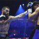 Beterbiev celebrates after beating Bivol to become undisputed champion Photo Credit: Leigh Dawney/Queensberry Promotions