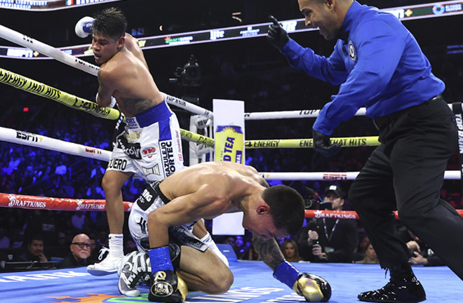 Navarrete knocked down Valdez three times to retain his WBO super featherweight crown Photo Credit: Mikey Williams/Top Rank