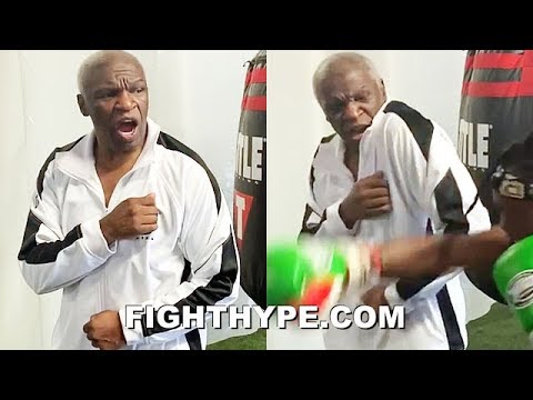 FLOYD MAYWEATHER SR. DEMONSTRATES SHOULDER ROLL EFFECTIVENESS; DEFLECTS "HARD AS YOU CAN" PUNCHES