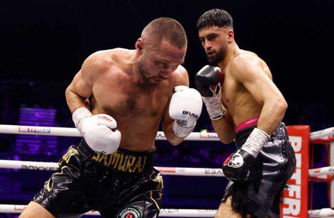 Azim dropped Lipinets in the third round Photo Credit: Lawrence Lustig/BOXXER