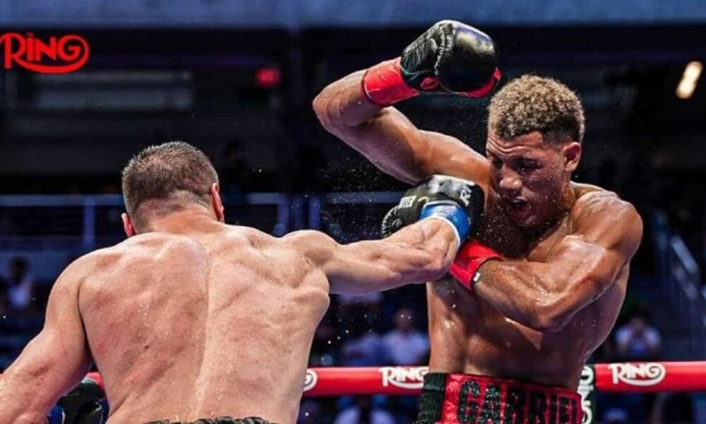 Imam Khataev lands a blow on David Morrell Jr during their controversial fight