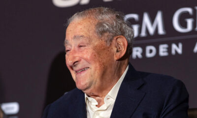 Bob Arum smiling at a press conference