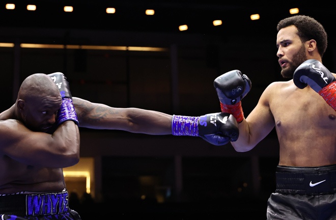 Whyte was dropped in the opening round by Itauma Photo Credit: Queensberry/Leigh Dawney