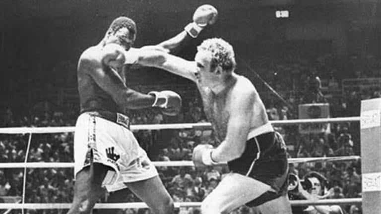 On This Day - Larry Holmes brutalizes Scott LeDoux