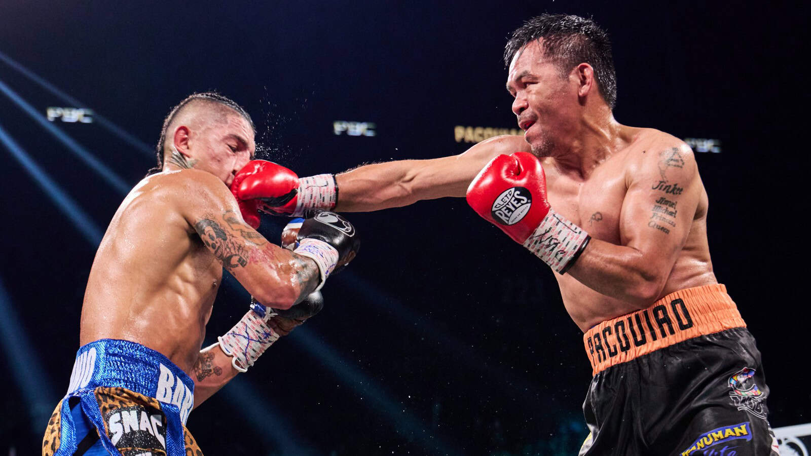 Manny Pacquiao jabs Mario Barrios