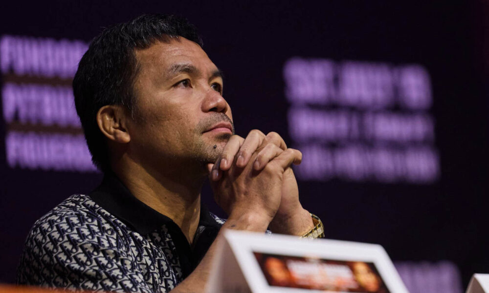 Manny Pacquiao thinking at the Barrios presser