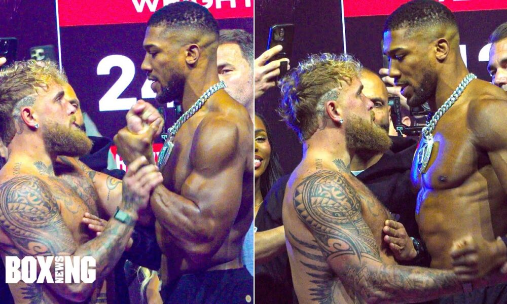 Anthony Joshua CHECKS Jake Paul As He PUTS HANDS On Him At Weigh In