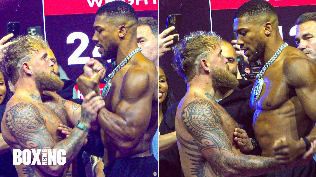 Anthony Joshua CHECKS Jake Paul As He PUTS HANDS On Him At Weigh In