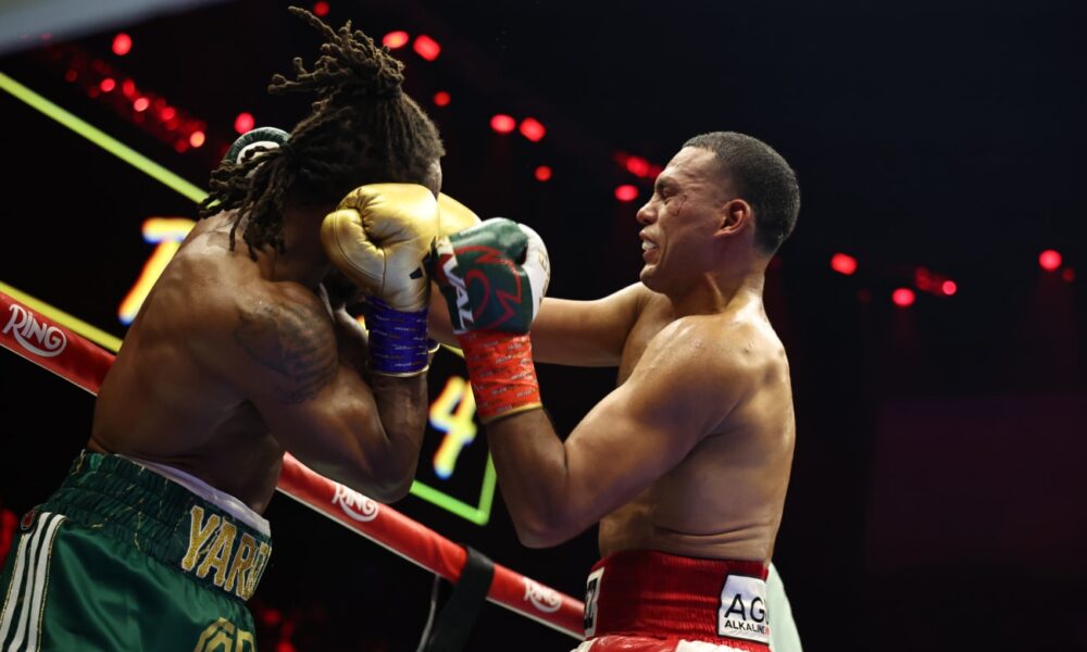 David Benavidez lands a right hand on Anthony Yarde as Yarde shells up on the ropes during their light heavyweight fight at the ANB Arena in Riyadh, Saudi Arabia, on November 22, 2025.