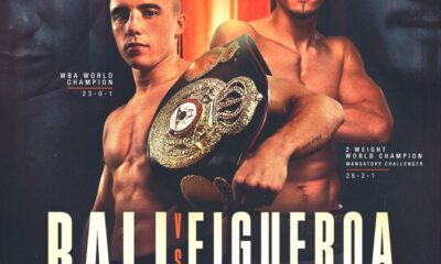 Promotional poster for Nick Ball vs. Brandon Figueroa, showing WBA featherweight champion Ball holding his title belt beside challenger Figueroa, with event details for their February 7 fight at the M&S Bank Arena in Liverpool.