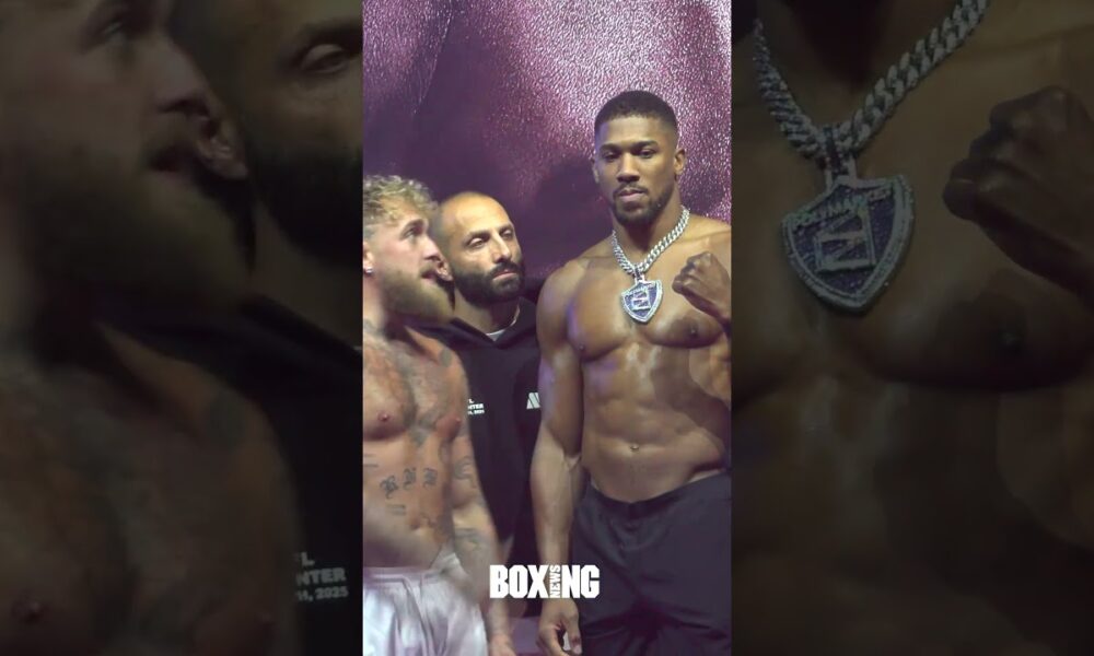 Jake Paul Puts Fist To Anthony Joshua's Face Following Weigh In
