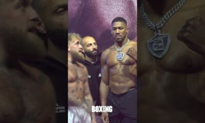 Jake Paul Puts Fist To Anthony Joshua's Face Following Weigh In
