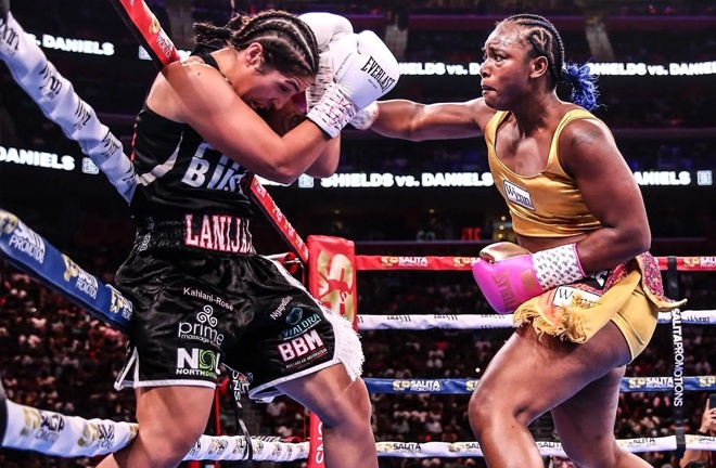 Claressa Shields lands a right hand on Lani Daniels during their undisputed heavyweight title clash at Little Caesars Arena in Detroit. Shields dominated en route to a unanimous decision victory.