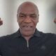 Mike Tyson flexes his arms while showing slimmer physique ahead of potential Floyd Mayweather fight
