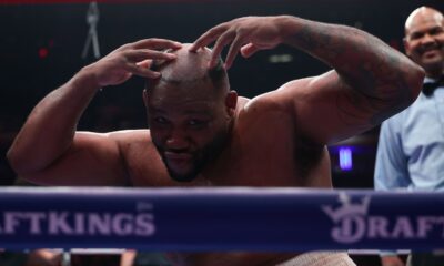 Jarrell Miller poses without his toupee at the end of his fight against Kingsley Ibeh