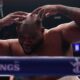 Jarrell Miller poses without his toupee at the end of his fight against Kingsley Ibeh