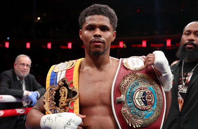 Stevenson celebrates winning the WBO and Ring super lightweight titles Photo: Cris Esqueda Matchroom Boxing