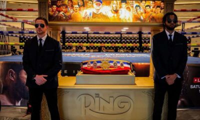 The Ring Magazine championship belt on display in Las Vegas during a major boxing event.