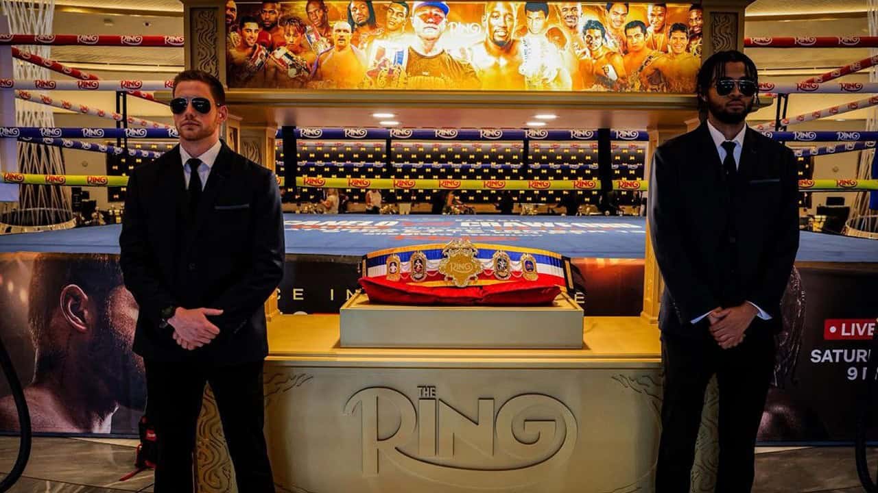 The Ring Magazine championship belt on display in Las Vegas during a major boxing event.