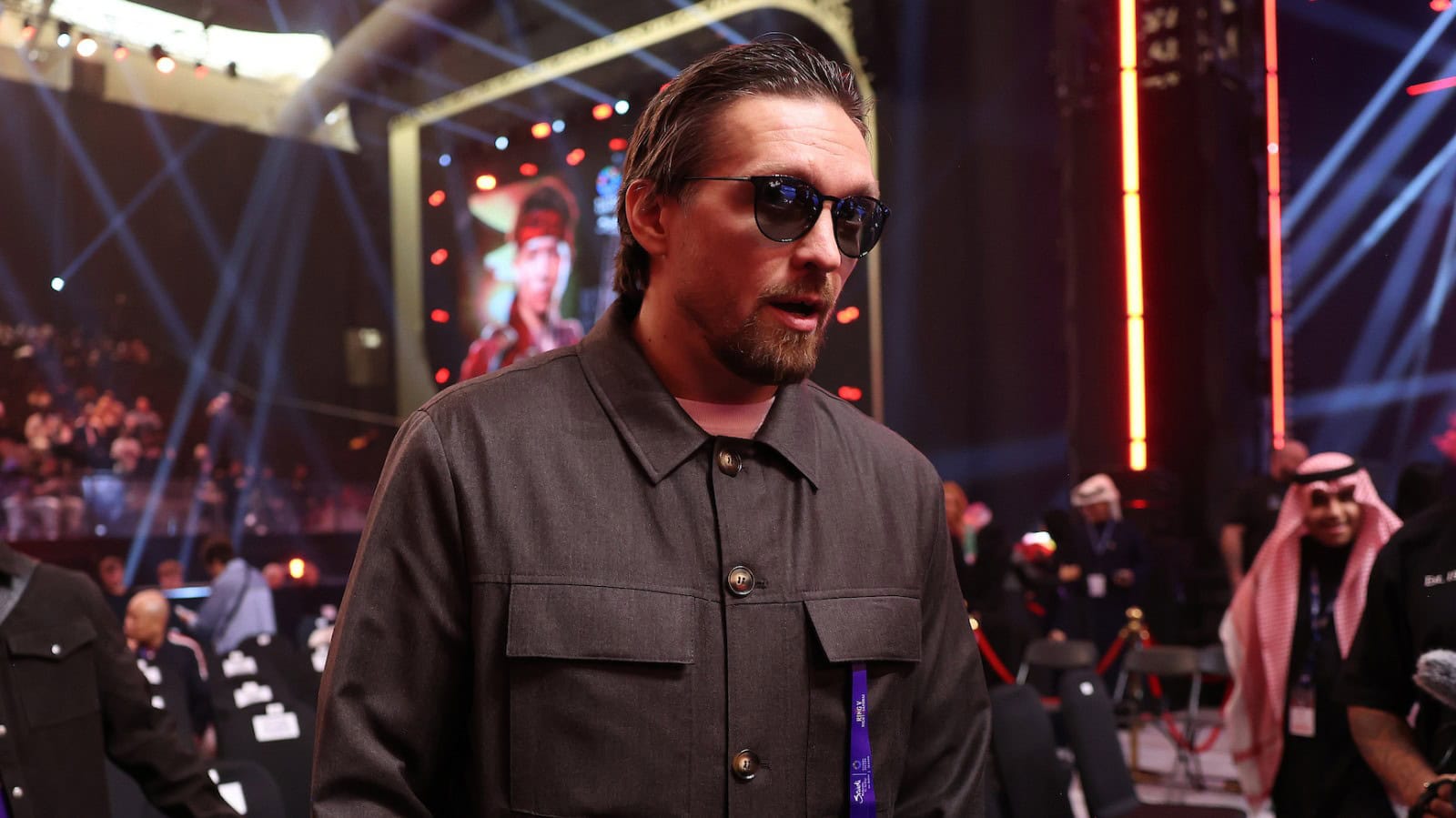 Oleksandr Usyk pictured in New York at the Lopez vs Stevenson fight, seated ringside in casual attire during the event.