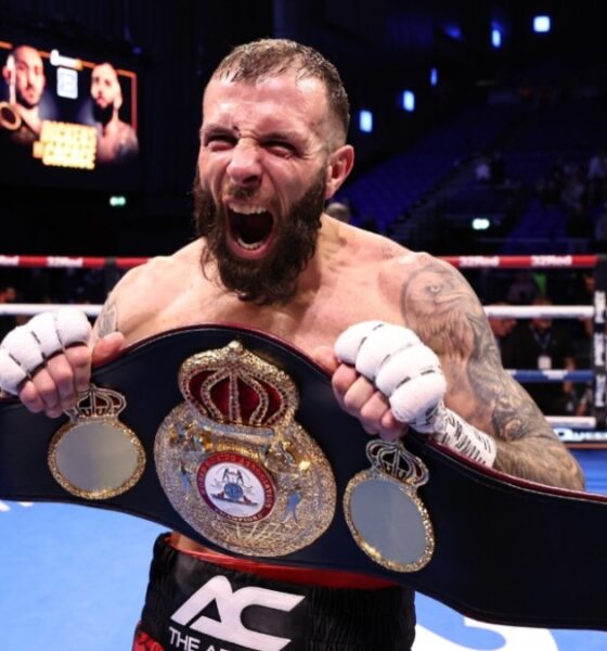 Anthony Cacace celebrates after defeating Jazza Dickens to win the WBA super featherweight title in Dublin