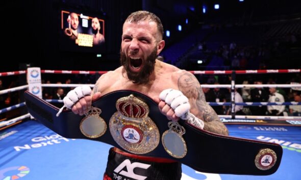 Anthony Cacace celebrates after defeating Jazza Dickens to win the WBA super featherweight title in Dublin