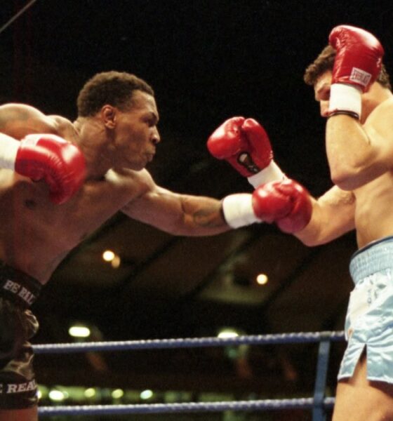 Mike Tyson throwing a punch in his professional career vs Lou Savarese