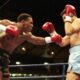 Mike Tyson throwing a punch in his professional career vs Lou Savarese