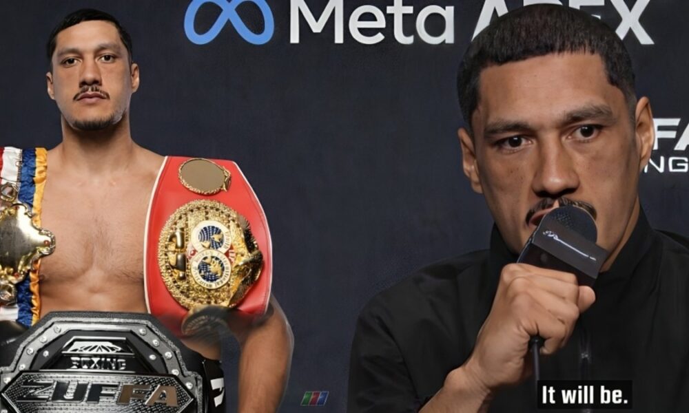 Jai Opetaia speaks at a press conference as the Zuffa championship belt and his former IBF title are shown