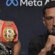 Jai Opetaia speaks at a press conference as the Zuffa championship belt and his former IBF title are shown