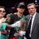 Ryan Garcia poses with WBC President Mauricio Sulaiman and the WBC title belt
