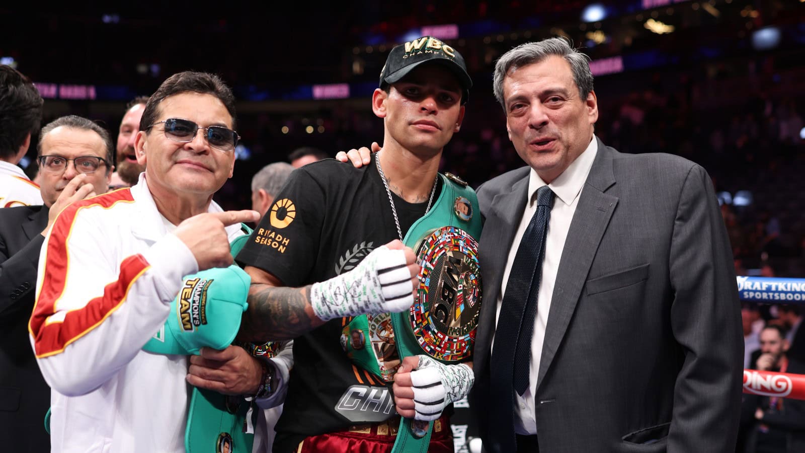 Ryan Garcia poses with WBC President Mauricio Sulaiman and the WBC title belt