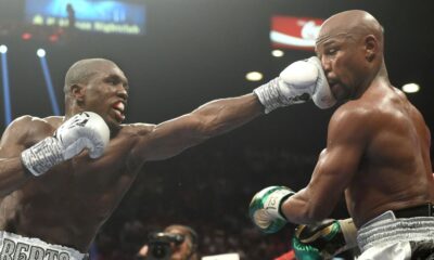 Andre Berto lands a punch on Floyd Mayweather during their 2015 welterweight fight in Las Vegas