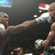 Andre Berto lands a punch on Floyd Mayweather during their 2015 welterweight fight in Las Vegas