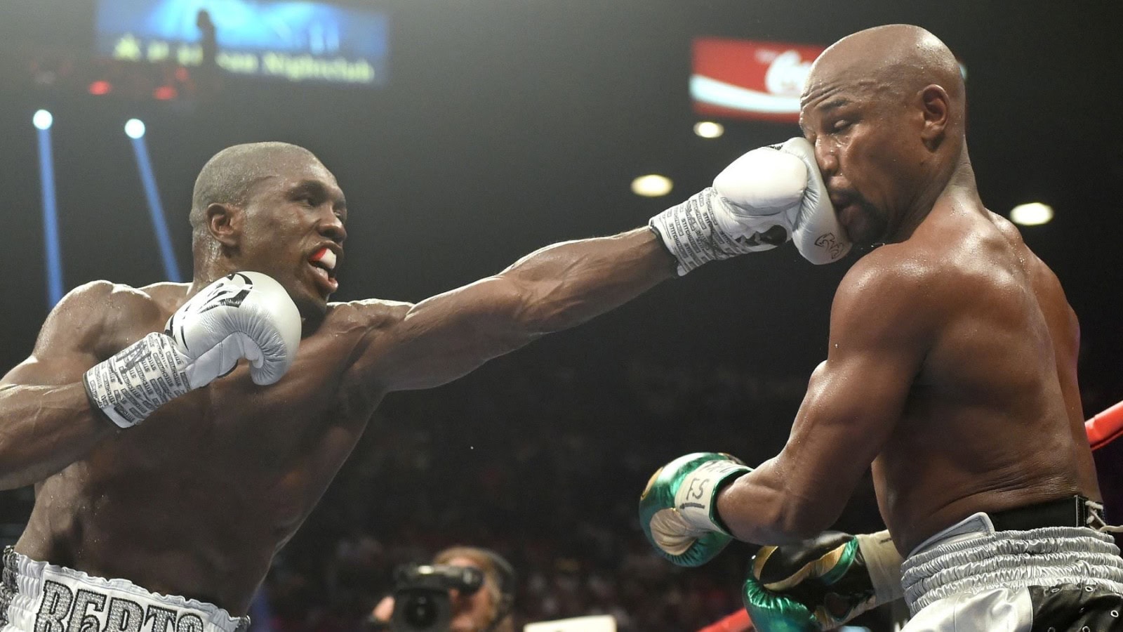 Andre Berto lands a punch on Floyd Mayweather during their 2015 welterweight fight in Las Vegas