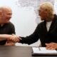 Conor Benn shakes hands with Dana White in Las Vegas after signing an upgraded multi-fight Zuffa deal