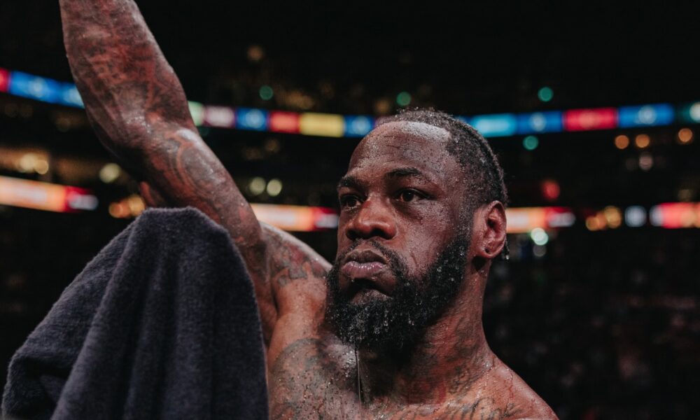 Deontay Wilder celebrates after defeating Derek Chisora in London.