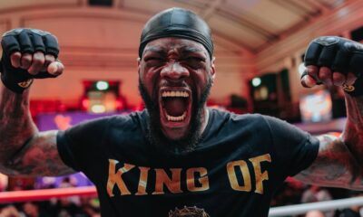 Deontay Wilder shouts with raised fists during a media appearance ahead of his proposed fight with Derek Chisora