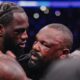 Wilder and Chisora ​​hug after the battle. Photo: MF Pro/David Cavan