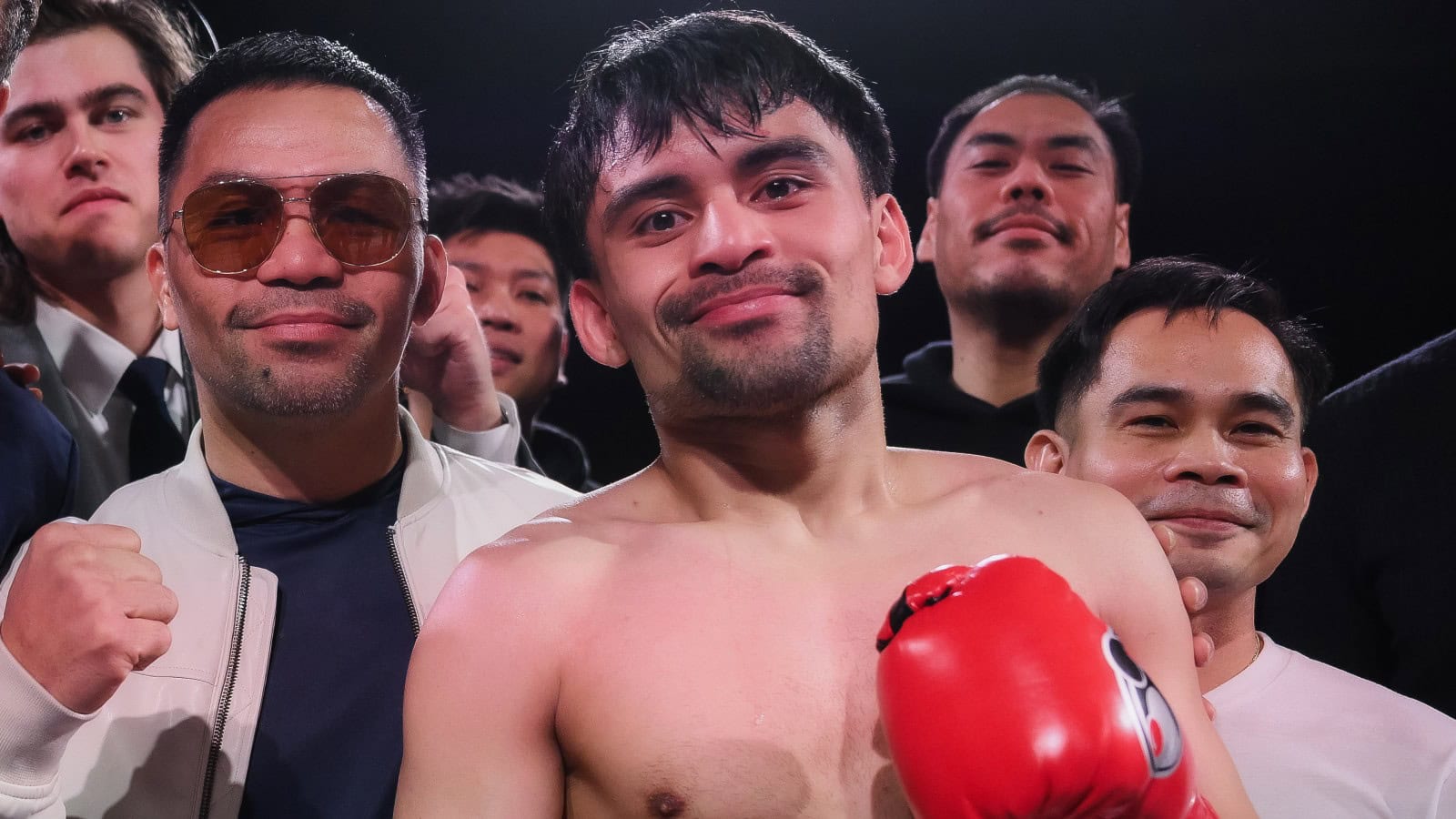 Jimuel Pacquiao celebrates victory with father Manny Pacquiao ringside in Temecula