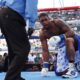 Jared Anderson down on one knee after knockdown during Martin Bakole fight