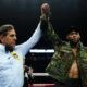 Amari Jones celebrates with his arm raised after stopping former world champion Vincenzo Gualtieri during their middleweight fight in San Jose.