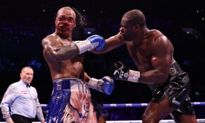 Fabio Wardley takes a heavy right hand from Daniel Dubois during their WBO heavyweight title fight in Manchester as Dubois stages a comeback victory.